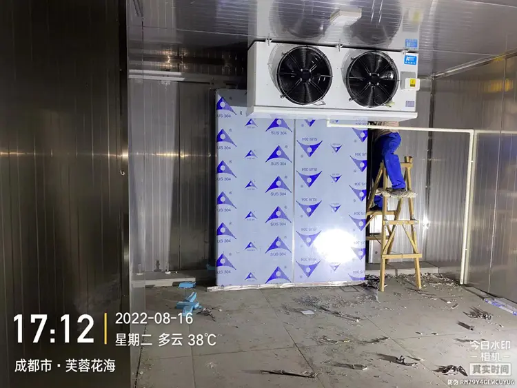 Workers installing air coolers