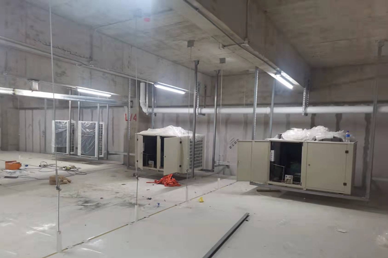 Refrigeration units are installed suspended on the top of the warehouse.
